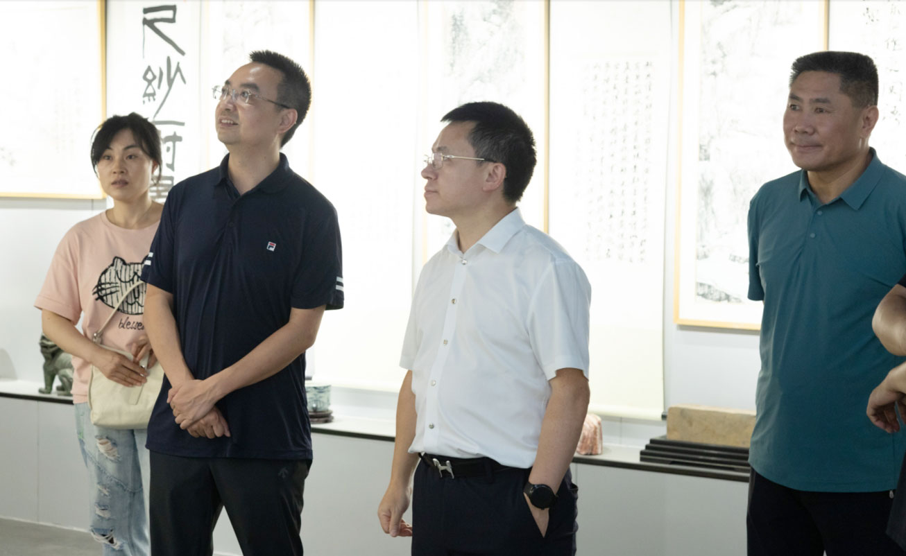 热烈欢迎三台县统战部部长李建军一行莅临卡酷尚参观指导
